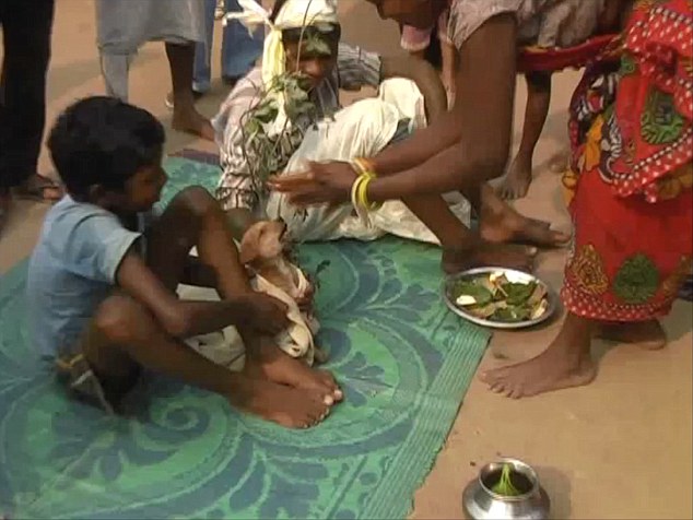 JHARKHAND, INDIA - JANUARY 19, 2016: Seven-year-old Mukesh was married off to a bitch to ward off evil spirits in Manik Bazar area of Jharkhand. Pictures Supplied By: Cover Asia Press