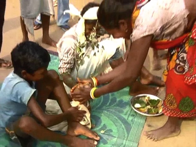 JHARKHAND, INDIA - JANUARY 19, 2016: Seven-year-old Mukesh was married off to a bitch to ward off evil spirits in Manik Bazar area of Jharkhand. Pictures Supplied By: Cover Asia Press