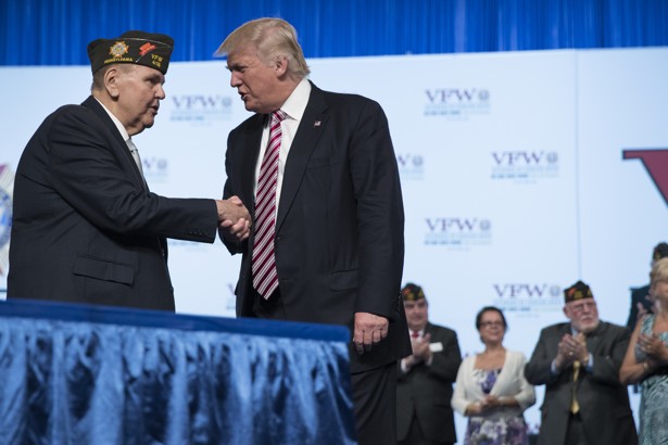 Republican presidential candidate Donald Trump shakes hands with VFW Commander in Chief John A. Biedrzycki during a Veterans of Foreign Wars convention, Tuesday, July 26, 2016, in Charlotte, N.C. (AP Photo/Evan Vucci)