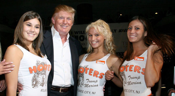 ATLANTIC CITY, NJ - SEPTEMBER 01: Donald J.Trump poses with Hooters Girls at the Donald Trump's Ultimate Deal Cash Giveaway at the Trump Marina Hotel and Casino on September 1, 2007 in Atlantic Ciyt, New Jersy. (Photo by Nick Valinote/FilmMagic)